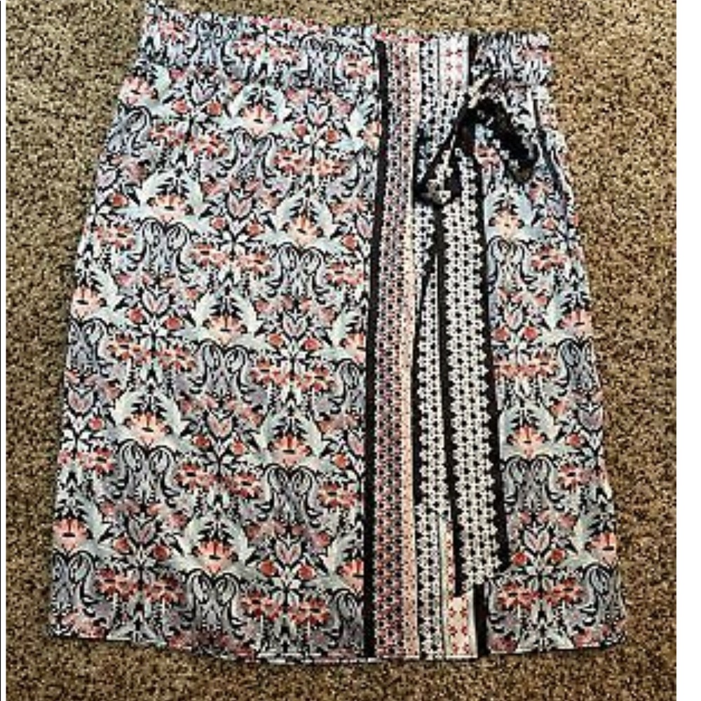 Loft womens skirt with elastic waistband and faux wrap style.  Size L